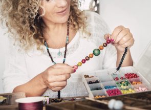 portrait-of-adult-woman-creating-beads-bracelets-a-LTCS3JJ.jpg